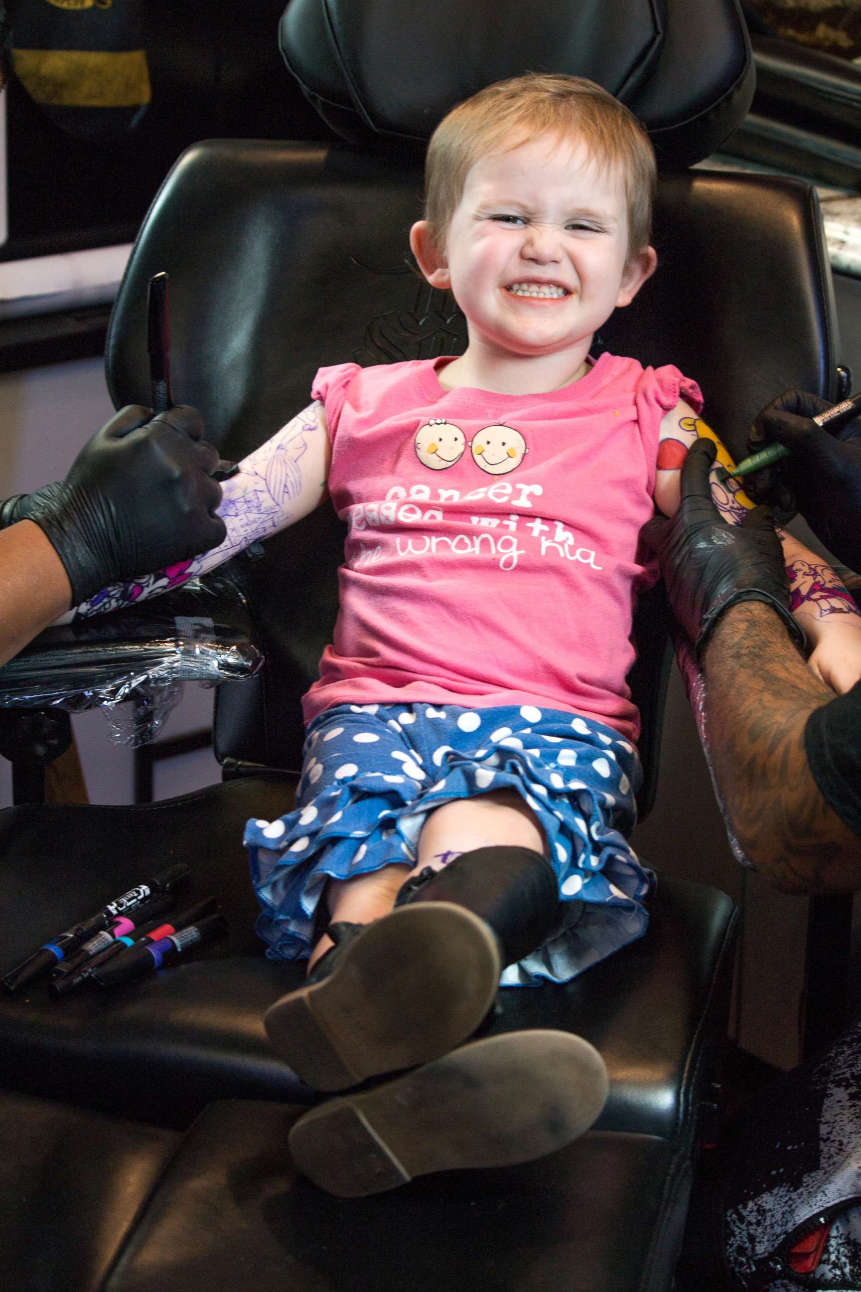 PHOTO: Trinity D'Autorio, 3, received temporary tattoos at Ink Wolves tattoo shop in Tampa, Fla., since she loves looking at her father's tattoos. 