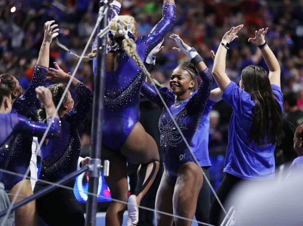 PHOTO: University of Florida gymnast Trinity Thomas scored a perfect 10 on the uneven bars in a Jan. 24, 2020, match against Louisiana State University.