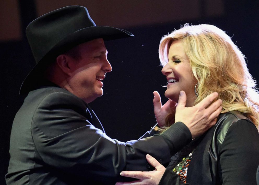 PHOTO: In this April 17, 2015, file photo, hosts Garth Brooks and Trisha Yearwood embrace onstage during the ACM Lifting Lives Gala in Dallas, Texas.