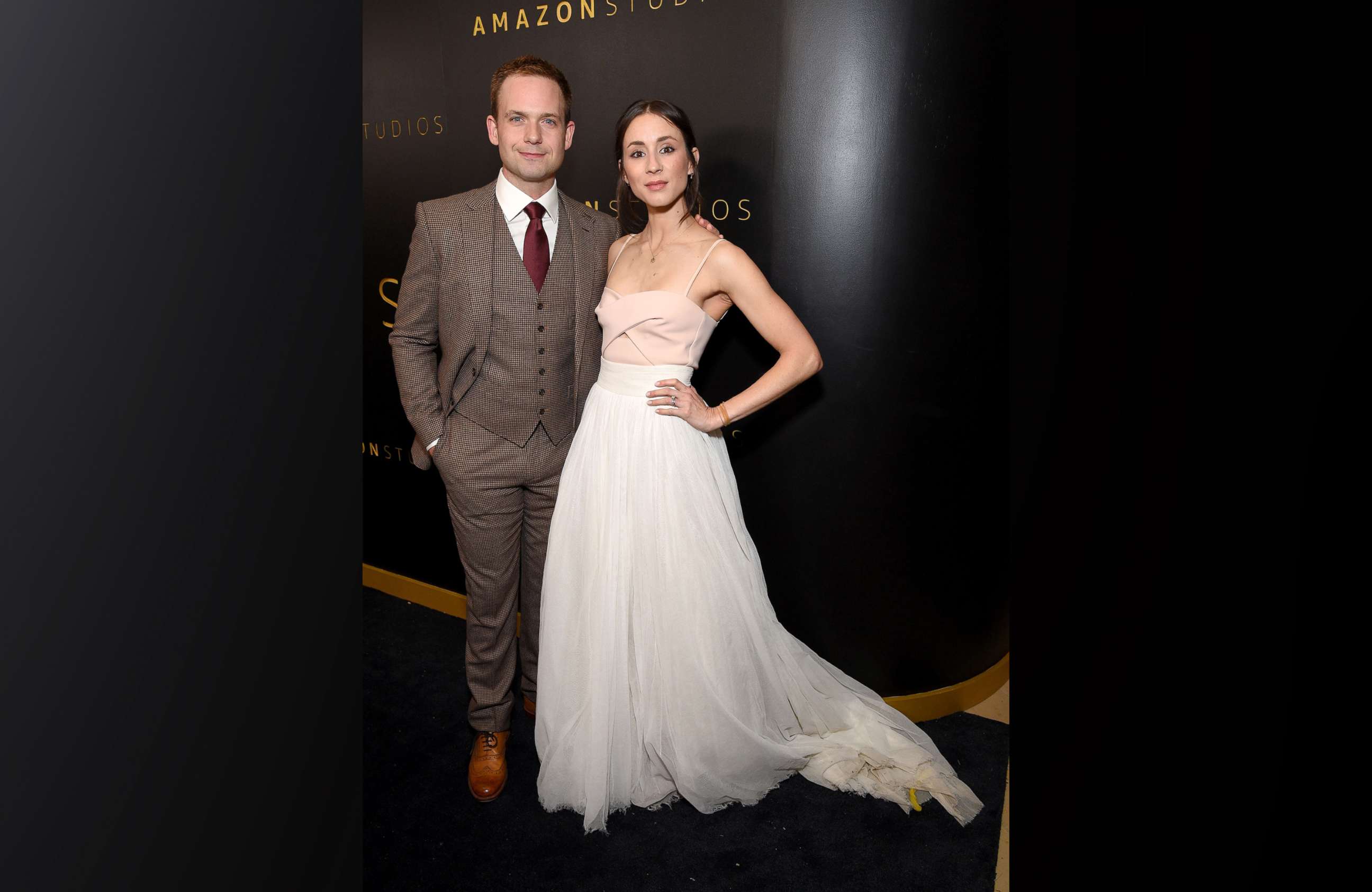PHOTO: Patrick J. Adams and Troian Bellisario pose on the red carpet for a Golden Globes party in Los Angeles, Jan. 5, 2020.