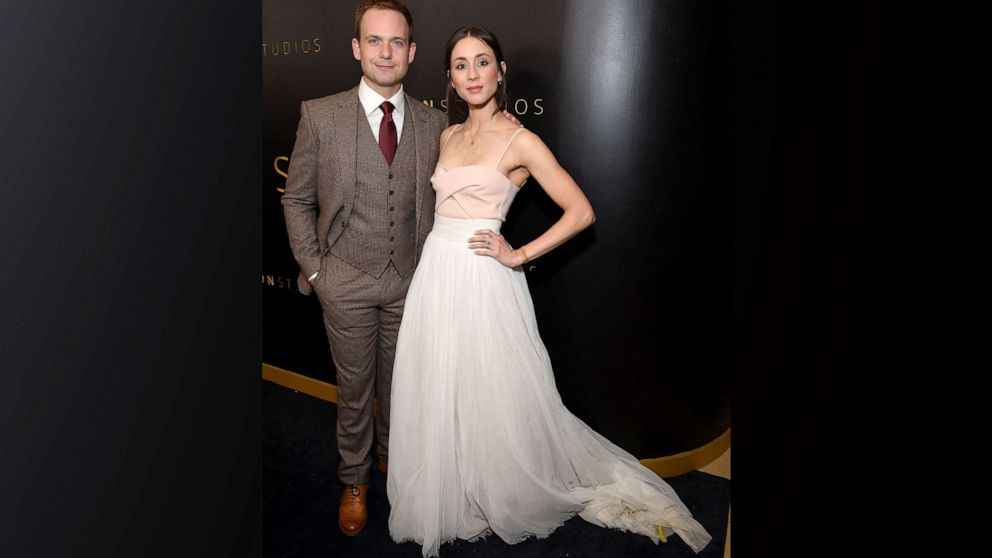 PHOTO: Patrick J. Adams and Troian Bellisario pose on the red carpet for a Golden Globes party in Los Angeles, Jan. 5, 2020.