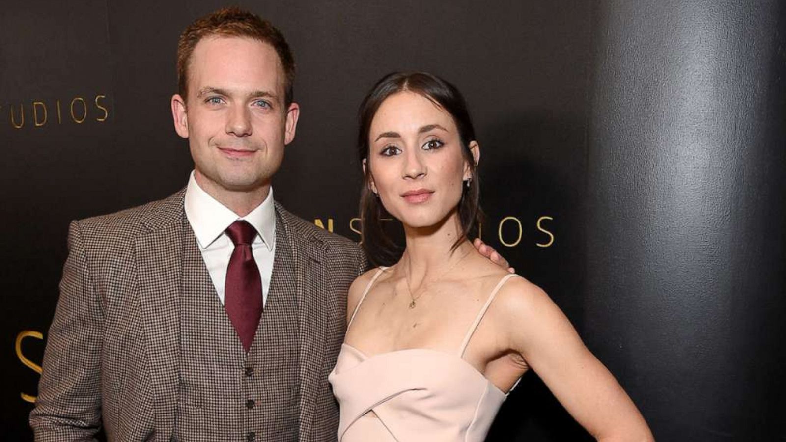 PHOTO: Patrick J. Adams and Troian Bellisario pose on the red carpet for a Golden Globes party in Los Angeles, Jan. 5, 2020.