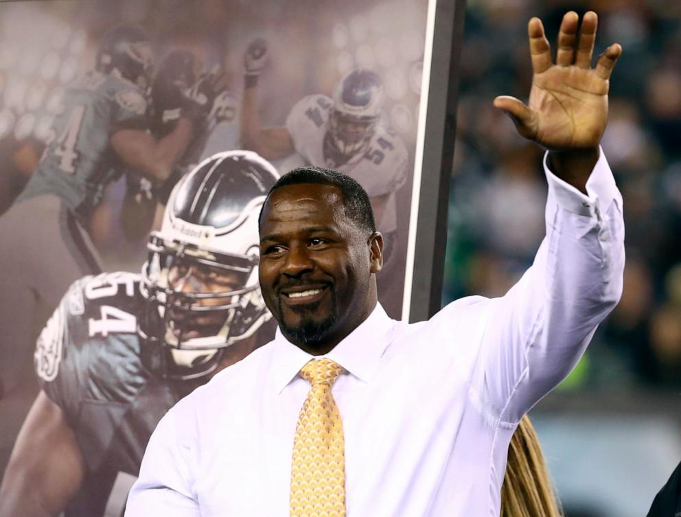 PHOTO: Former Philadelphia Eagles linebacker Jeremiah Trotter waves to the crowd during his Eagles team Hall of Fame induction at halftime of the game against the Green Bay Packers at Lincoln Financial Field on November 28, 2016 in Philadelphia.