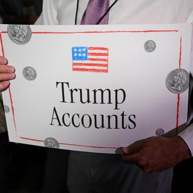 PHOTO: An attendee holds a Trump Accounts sign during a "Trump Accounts Tour" event in Westlake Village, Calif., May 29, 2026.