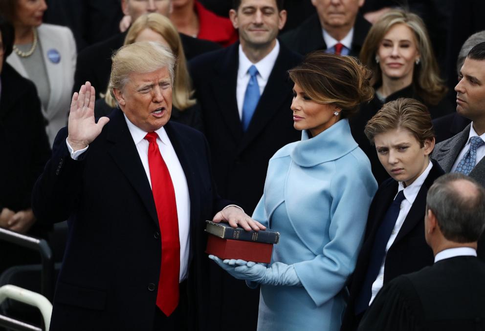 PHOTO: In this Jan. 20, 2017 file photo President-elect Donald Trump takes the oath of office as First Lady-elect Melania Trump stands during the 58th presidential inauguration in Washington, D.C.