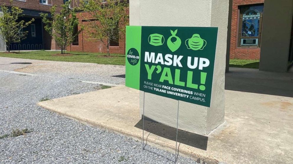 PHOTO: In this June 21, 2020, file photo, signs remind members to wear masks to prevent the spread of COVID-19 at Tulane University in New Orleans.