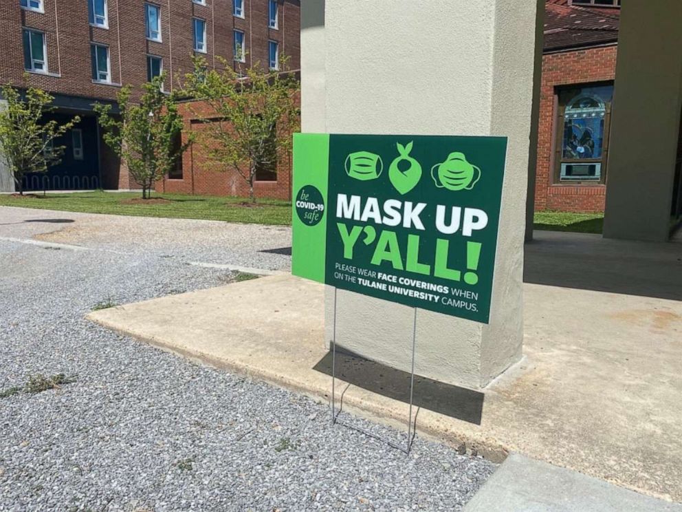 PHOTO: In this June 21, 2020, file photo, signs remind members to wear masks to prevent the spread of COVID-19 at Tulane University in New Orleans.