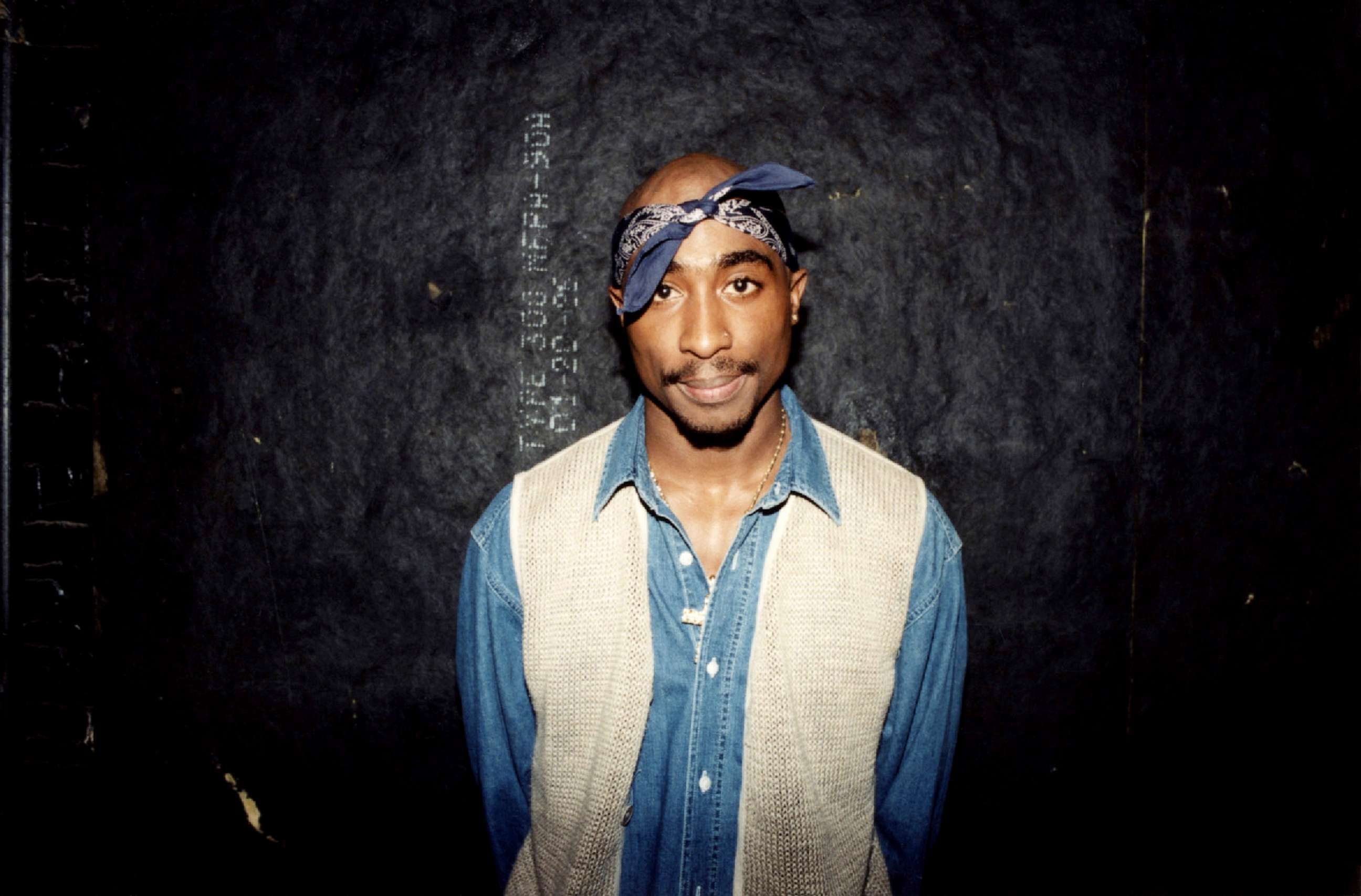 PHOTO: Rapper Tupac Shakur poses for photos backstage after his performance at the Regal Theater in Chicago, Illinois in March 1994.