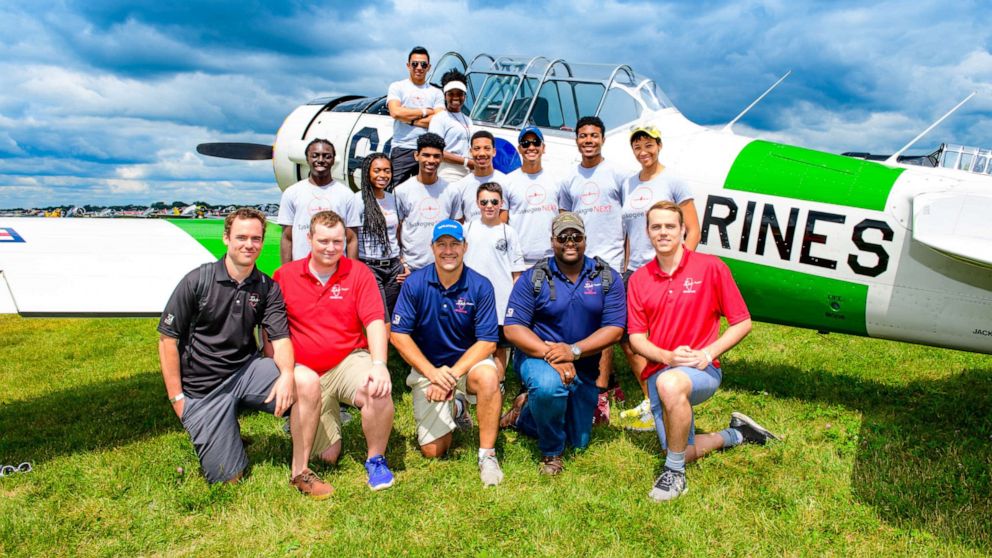 PHOTO: Cadets and instructors are pictured here at the Tuskegee Next program which teaches at-risk youth how to become a pilot.