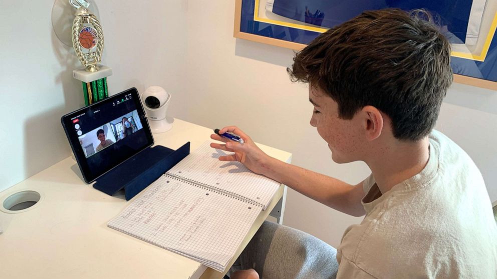 PHOTO: A student sits for a lesson hosted by Project Matriarchs, a service that offers virtual tutoring and child care support, with a focus on helping working mothers amid the pandemic. 