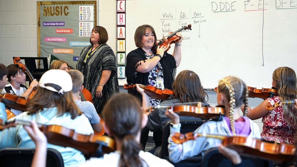 PHOTO: Sarah Lenhart and Becky Bush are both music teachers at Hudsonville Public Schools in Hudsonville, Michigan.
