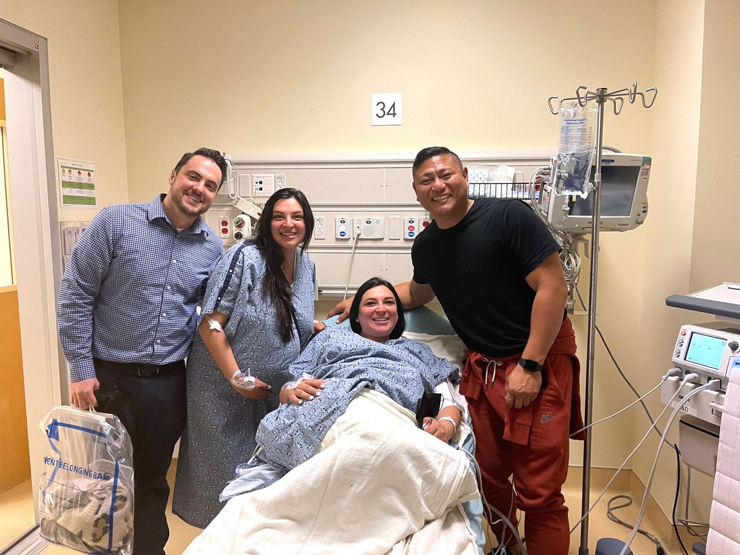 PHOTO: Erin and Zach Cheplak, far left, pose with Jill and Ian Justiniani at the California hospital where Erin and Jill each gave birth.
