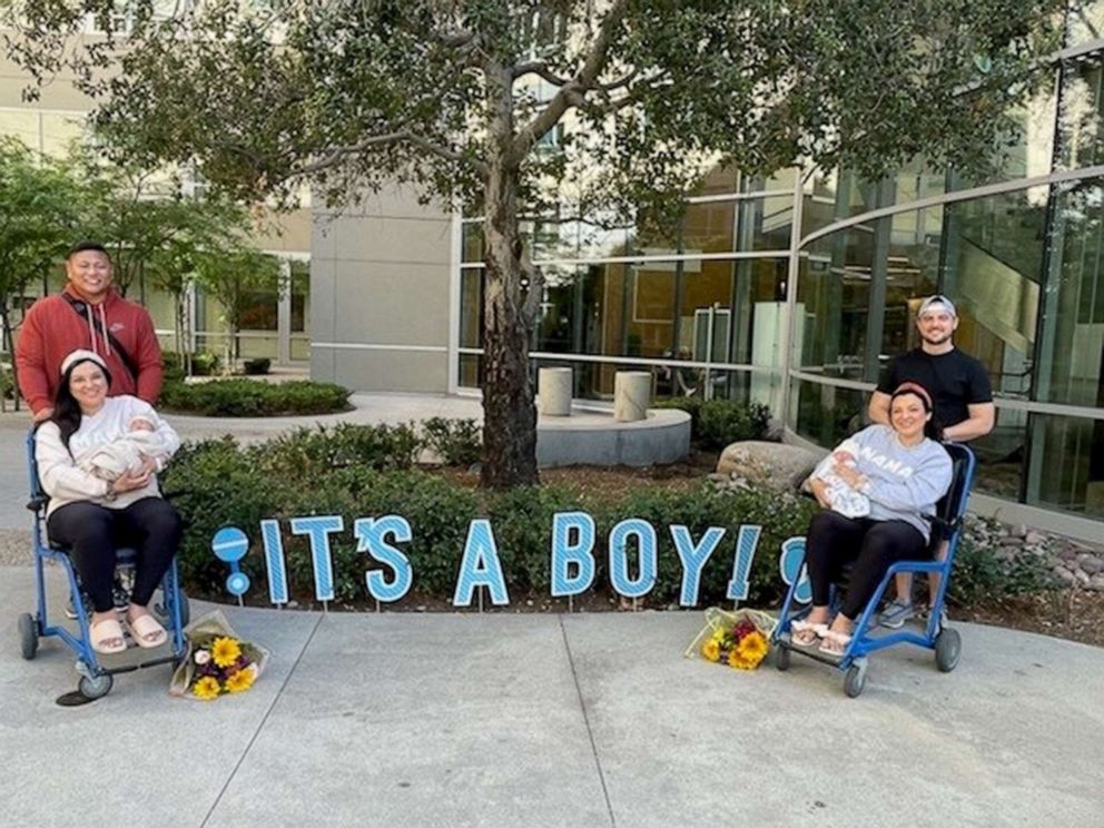 PHOTO: Jill and Ian Justiniani and their son Oliver, left, and Erin and Zach Cheplak and their son Silas pose in front of Anaheim Kaiser Hospital after their hospital stay.