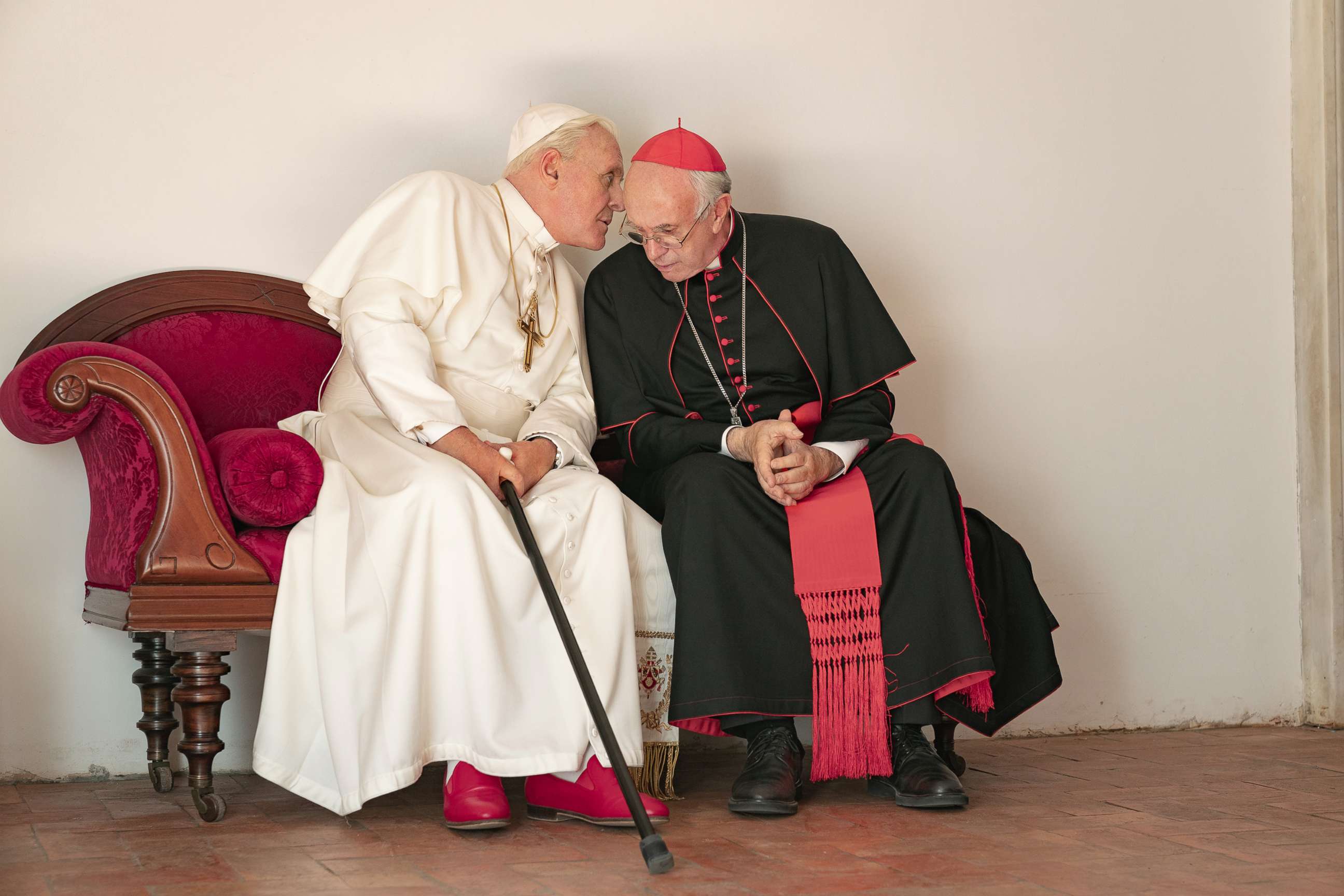 PHOTO: Anthony Hopkins as Pope Benedict, left, and Jonathan Pryce as Cardinal Bergoglio, right, in a scene from movie, "The Two Popes."