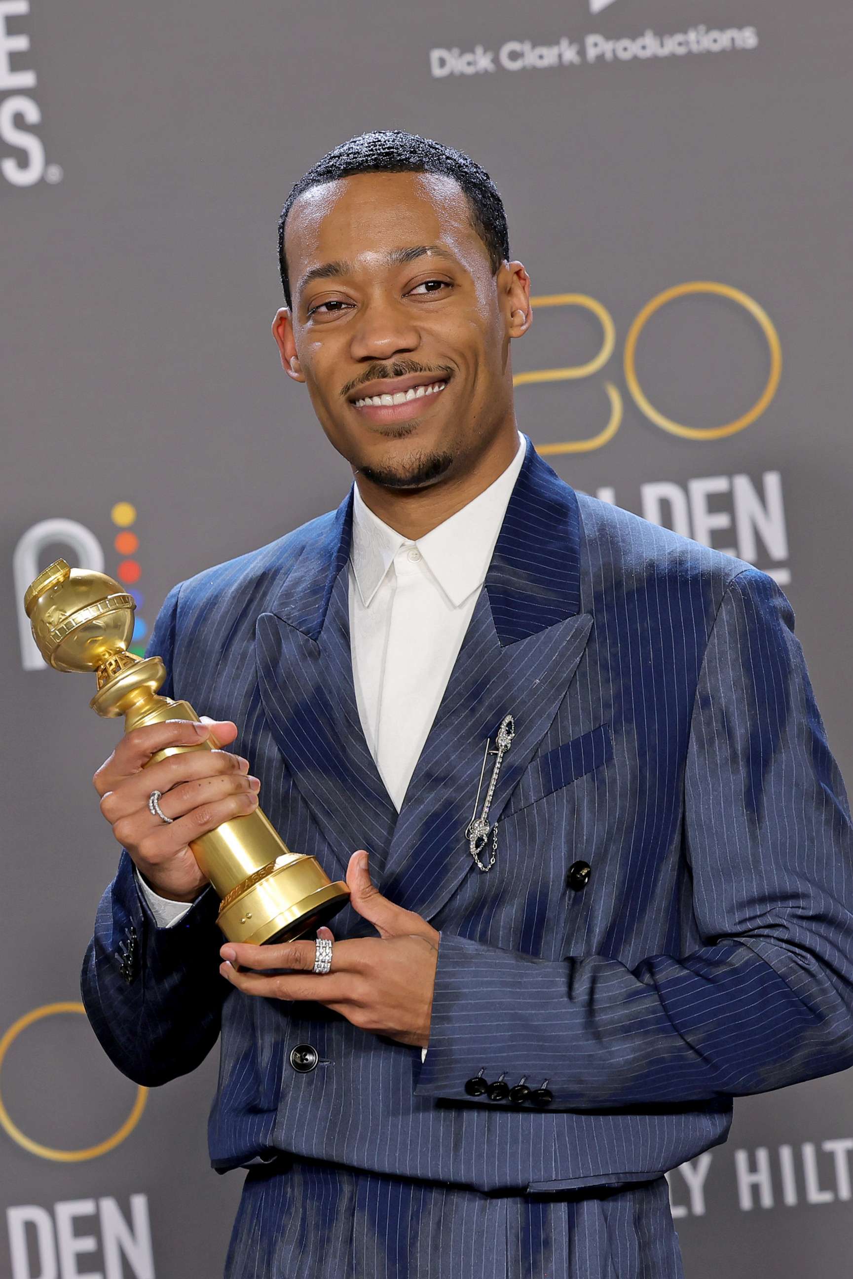 PHOTO: Tyler James Williams poses with the award for Best Supporting Actor - Television Series for "Abbott Elementary" in the press room at the 80th Annual Golden Globe Awards at The Beverly Hilton on Jan. 10, 2023 in Beverly Hills, Calif.