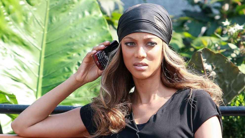 Tyra Banks talks on her cell phone as part of a performance of a dance flash mob for "The Tyra Banks Show" in Union Square on Aug. 17, 2009 in New York.