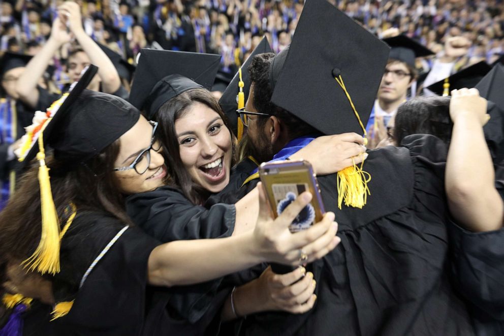 PHOTO: New graduates celebrate at the UCLA College of Letters and Science Commencement Ceremony on June 14, 2019, in Los Angeles.