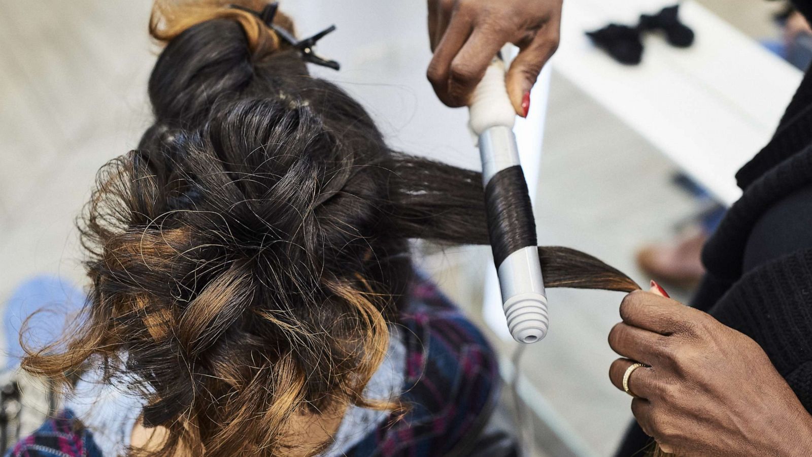 PHOTO: An employee styles a customer's hair at an Ulta Beauty Inc. store in New York, on May 31, 2018.