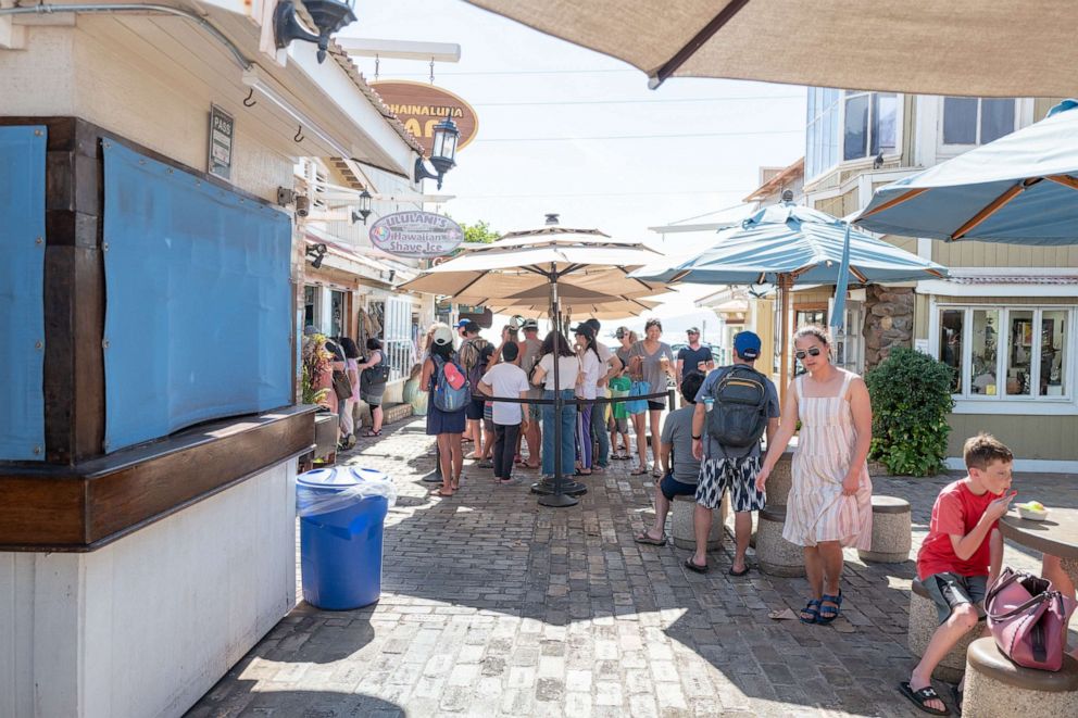 PHOTO: People line up in front of Ululani's shave ice in Lahaina, Hawaii on the island of Maui, Feb. 19, 2020.