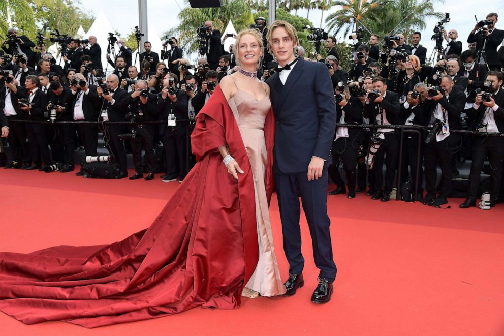 PHOTO: Uma Thurman and her Son Levon Roan Thurman-Hawke attend the "Jeanne du Barry" Screening & opening ceremony red carpet at the 76th annual Cannes film festival at Palais des Festivals on May 16, 2023 in Cannes, France.