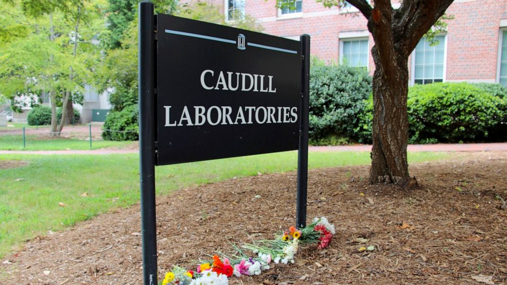 PHOTO: Flowers are seen piled up in front of Caudill Laboratories, Aug. 29, 2023, on the UNC-Chapel Hill campus, where a graduate student fatally shot his faculty advisor this week in Chapel Hill, N.C.