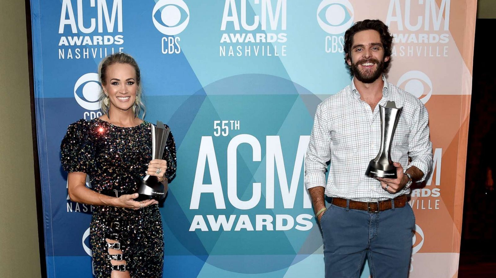 PHOTO: Carrie Underwood, left, and Thomas Rhett pose with their Entertainer of the Year awards at the 55th Academy of Country Music Awards at the Grand Ole Opry on Sept. 16, 2020, in Nashville, Tenn.