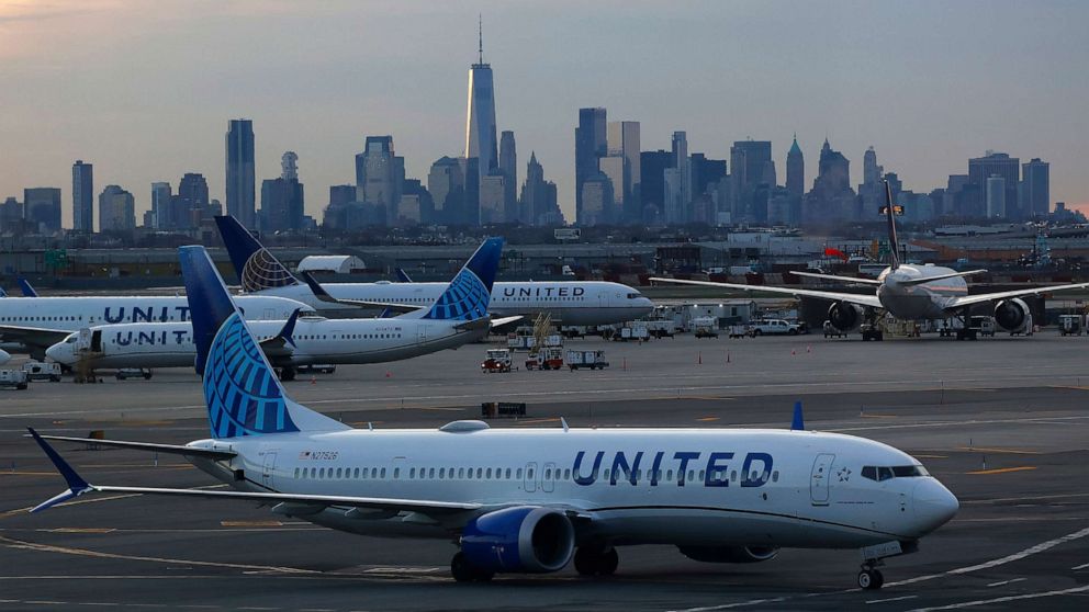 PHOTO: A United Airlines airplane makes its way to a gate in front of the skyline of lower Manhattan at Newark Liberty Airport, April 8, 2023, in Newark, N.J.