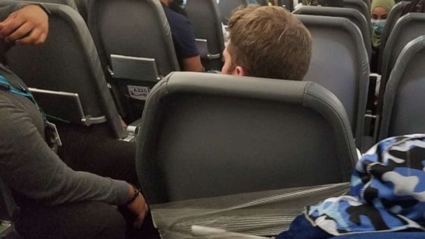 Frontier Flight Attendants Placed On Leave After Taping Unruly Passenger To Seat Abc News