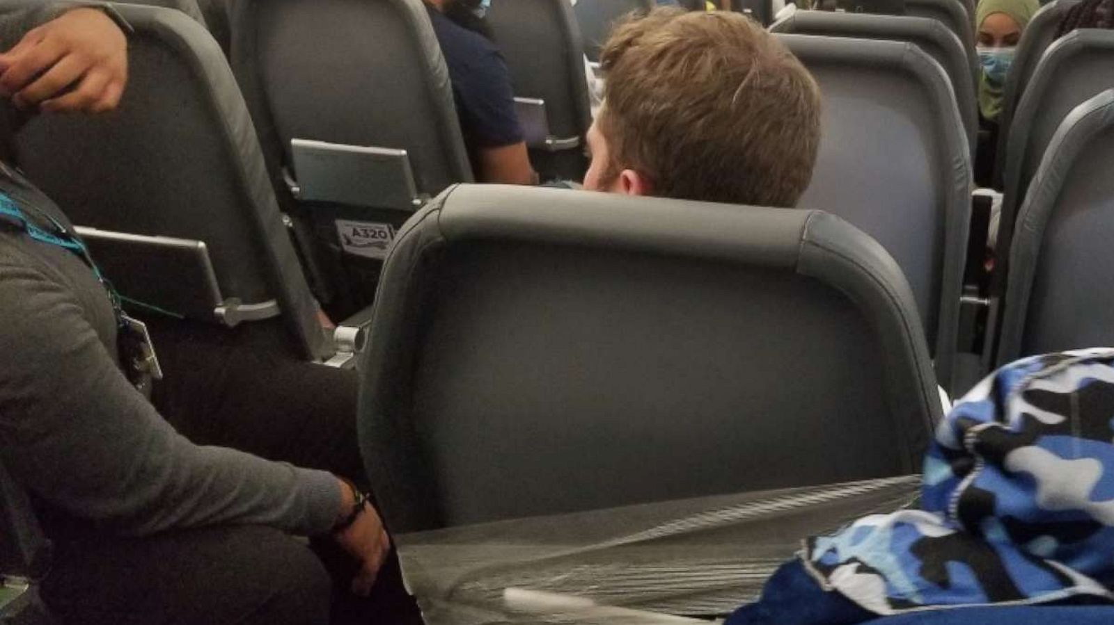 PHOTO: Frontier flight attendants had to tape a man to his seat after authorities said he allegedly groped the breasts of two flight attendants and punched a third.