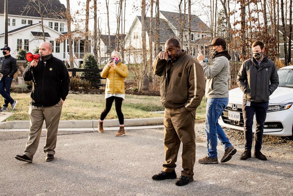 PHOTO: UPS delivery driver Anthony Gaskins from Chesterfield County, Virginia, sheds a tear after his UPS supervisors honor him for the work he's done over the past year.