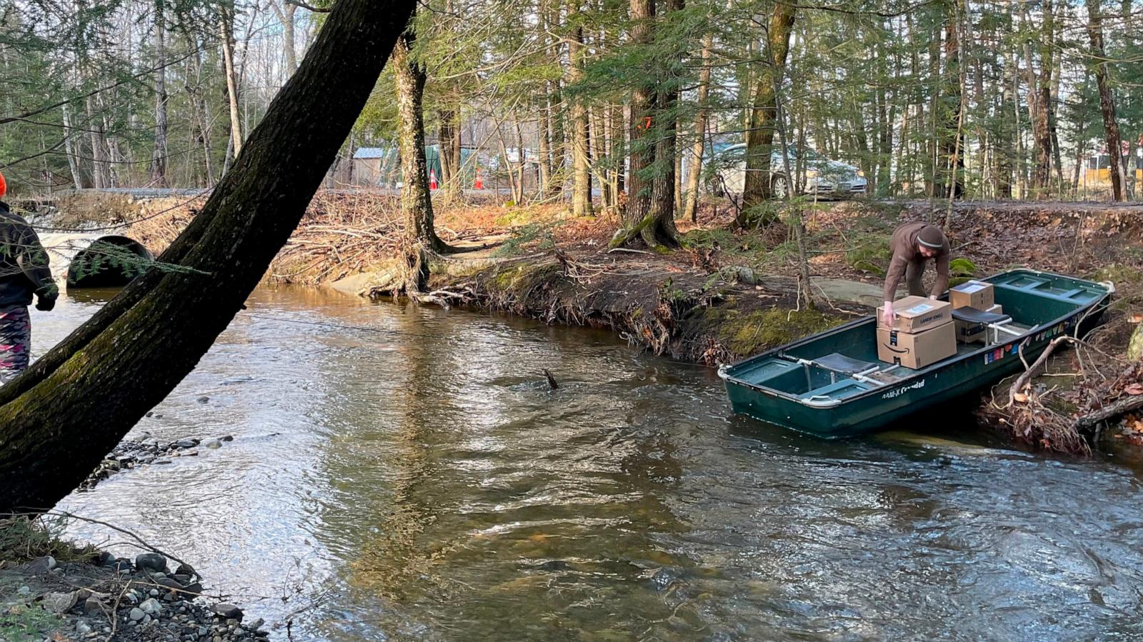 PHOTO: UPS driver Ryan Long used a boat to deliver packages amid the holiday season.