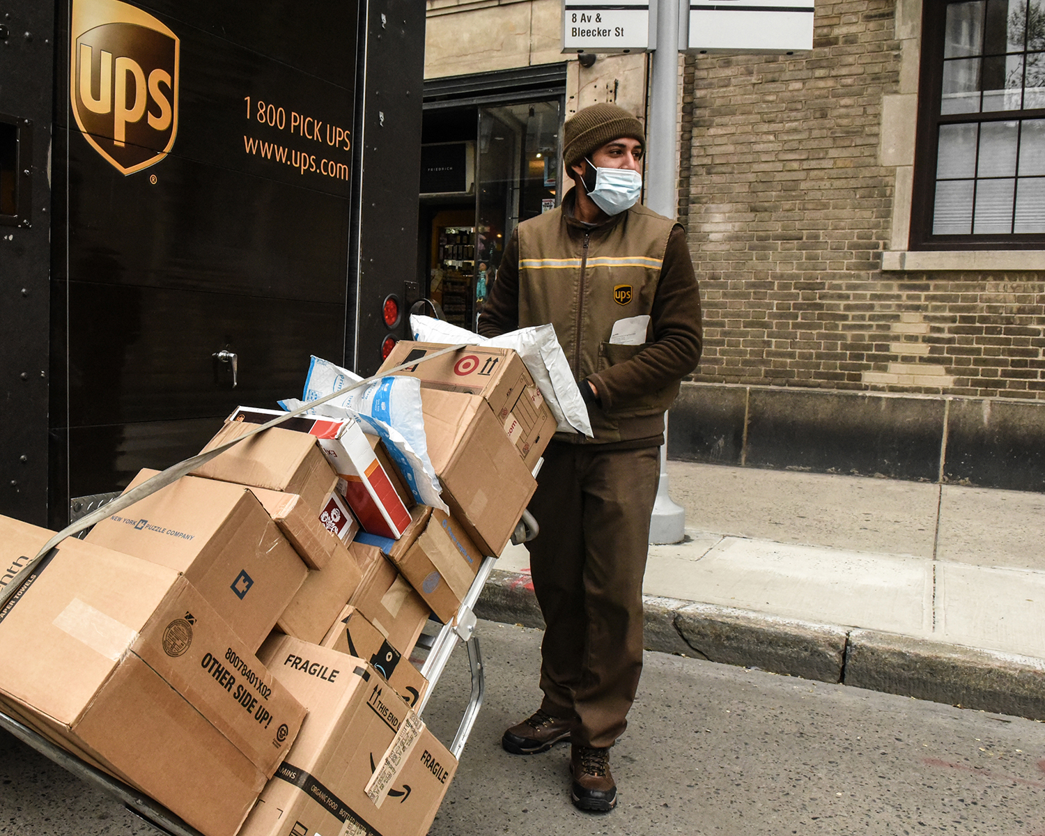 PHOTO: In this April 29, 2020, file photo, a UPS worker delivers packages in New York.