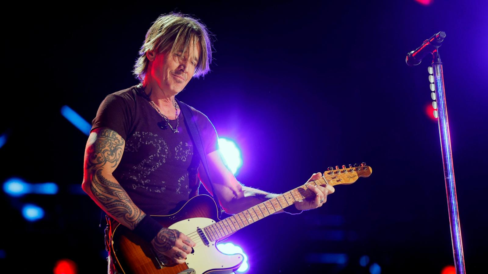 PHOTO: Keith Urban performs onstage during the 2024 CMA Music festival at the Nissan Stadium on June 8, 2024 in Nashville.