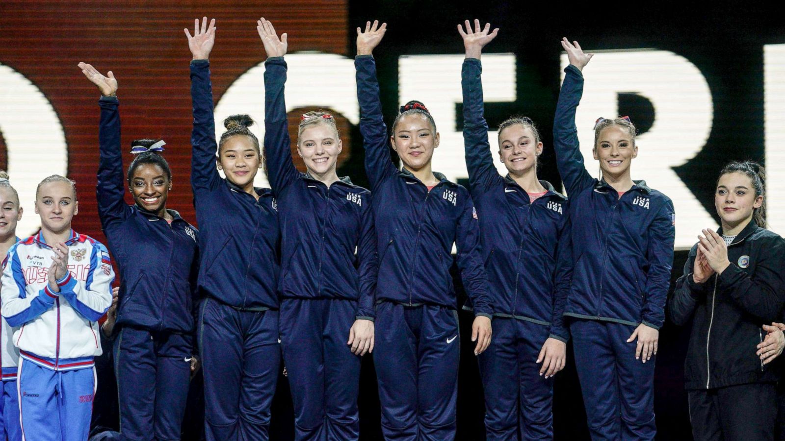 PHOTO: The winning US team celebrate with their gold medals on the podium after the women's team final at the FIG Artistic Gymnastics World Championships at the Hanns-Martin-Schleyer-Halle in Stuttgart, Germany, Oct. 8, 2019.