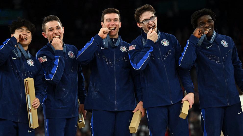 PHOTO: Team USA poses with their bronze medal during the podium ceremony for the artistic gymnastics men's team final during the Paris 2024 Olympic Games at the Bercy Arena in Paris, on July 29, 2024.