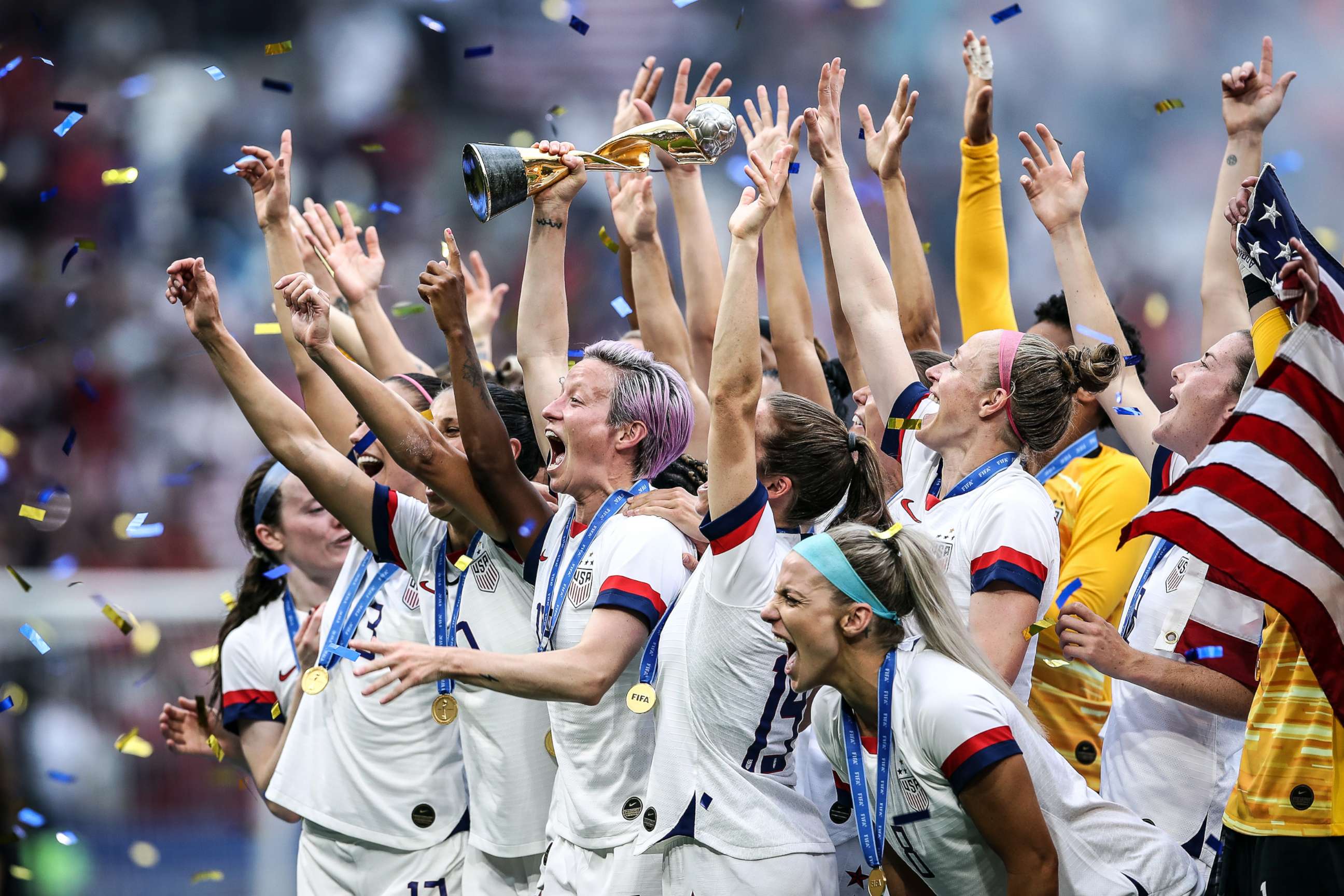 PHOTO: Megan Rapinoe of the USA lifts the FIFA Women's World Cup Trophy following her team's victory in the 2019 FIFA Women's World Cup France Final match between The U.S. and The Netherlands at Stade de Lyon on July 07, 2019, in Lyon, France.