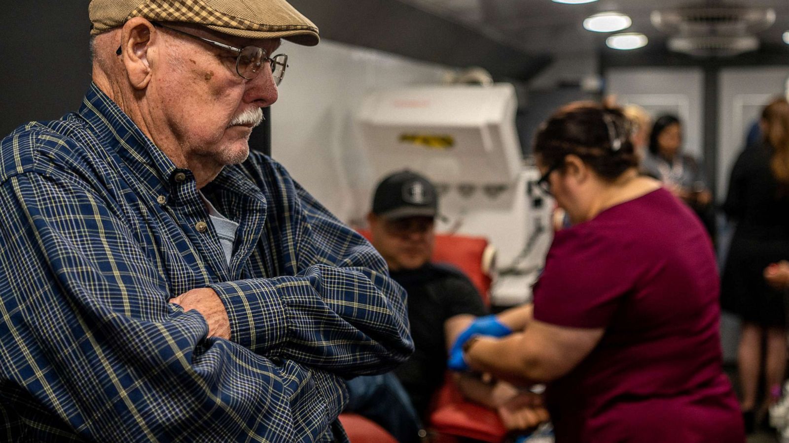 PHOTO: A Community member waits his turn to donate blood at the South Texas Blood Bank's emergency blood drive on May 25, 2022 in Uvalde, Texas.