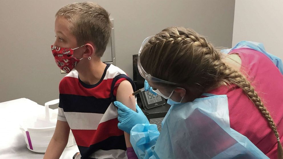 PHOTO: Kaden Sweeten, 10, gets his COVID-19 vaccine as part of Moderna's pediatric vaccine trial in Salt Lake City, Utah, April 28, 2021.