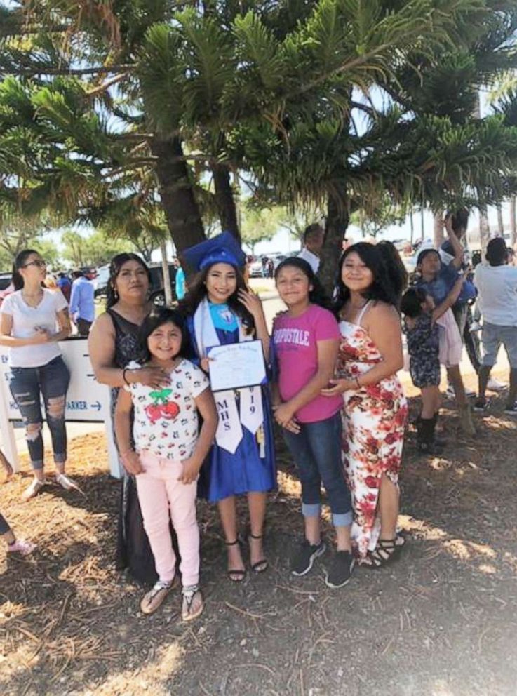 PHOTO: Brenda Alvarez-Lagunas is seen with her mother and sisters on Mulberry High School's graduation day on May 24, 2019.