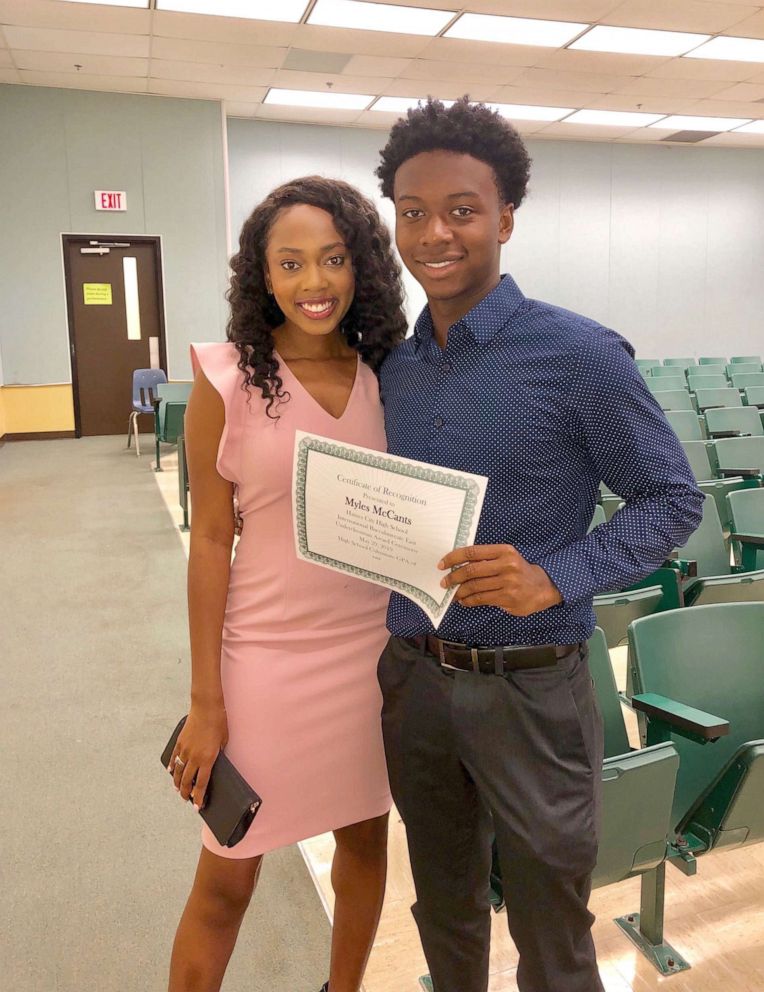 PHOTO: Myles McCants, 17, stands beside his sister, Taylar-Simone McCants, in an undated photo. Myles is is making history as the first African American male valedictorian at Haines City High School in Haines City, Florida.