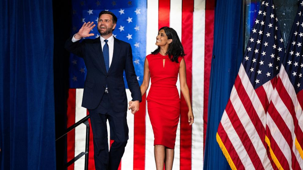 PHOTO: Republican vice presidential nominee Sen. J.D. Vance walks out with his wife Usha Vance to speak during a rally with running mate Republican Presidential nominee former President Donald Trump, July 27, 2024, in St Cloud, Minn.