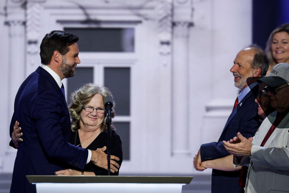 PHOTO: Republican vice presidential candidate, Sen. J.D. Vance and his mom Beverly Vance stand on stage on the third day of the Republican National Convention, July 17, 2024, in Milwaukee.