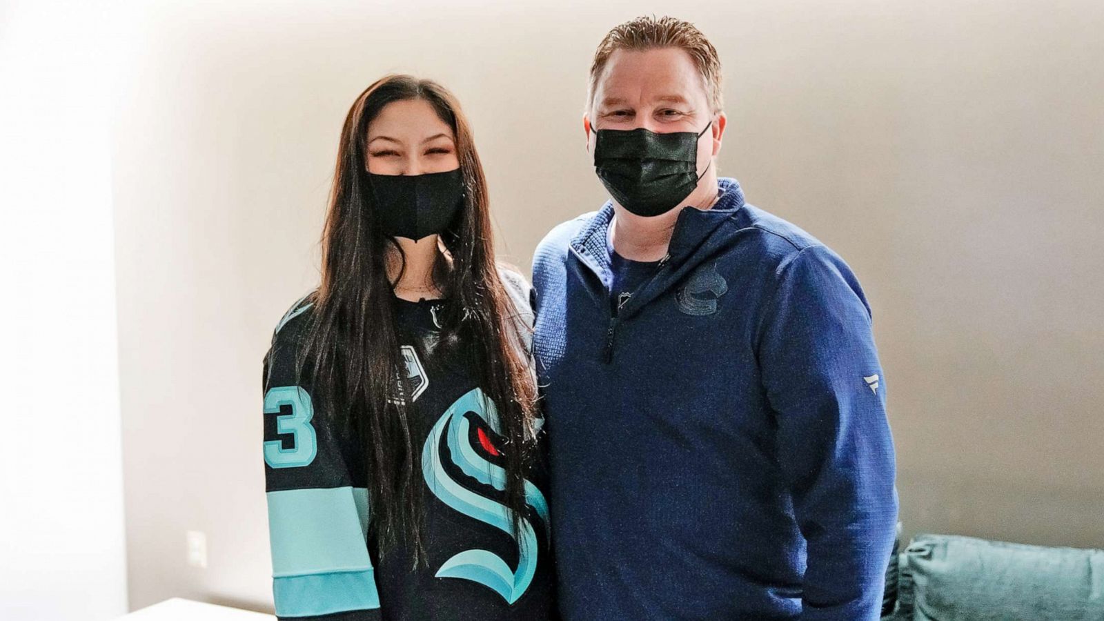 PHOTO: Seattle Kraken fan Nadia Popovici and Vancouver Canucks equipment manager Brian Hamilton meet before the game at Climate Pledge Arena on Jan. 1, 2022 in Seattle. Popovici alerted Hamilton at a previous, Oct. 23, 2021 game of a cancerous mole.