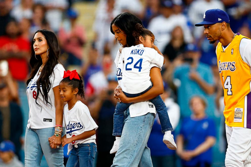 PHOTO: Vanessa Bryant, Bianka Bryant, Natalia Bryant, Capri Bryant and Mookie Betts before a game between the Atlanta Braves and the Los Angeles Dodgers on "Lakers Night" at Dodger Stadium on Sept. 1, 2023 in Los Angeles.