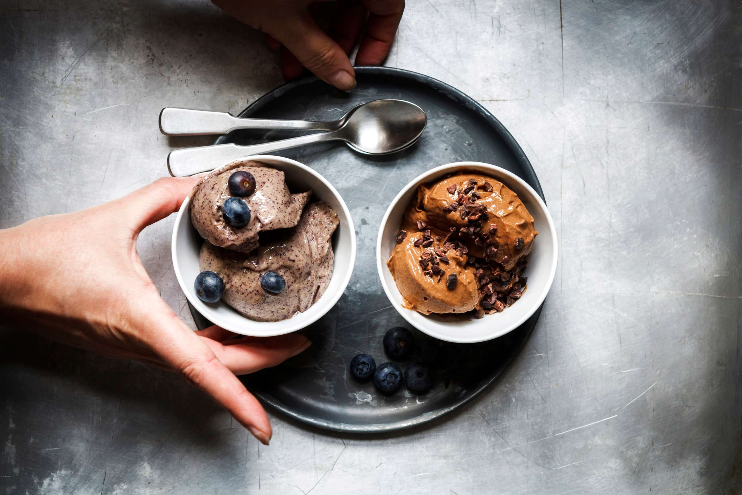 PHOTO: Bowls of vegan blueberry banana and chocolate banana ice cream are pictured in a stock photo.