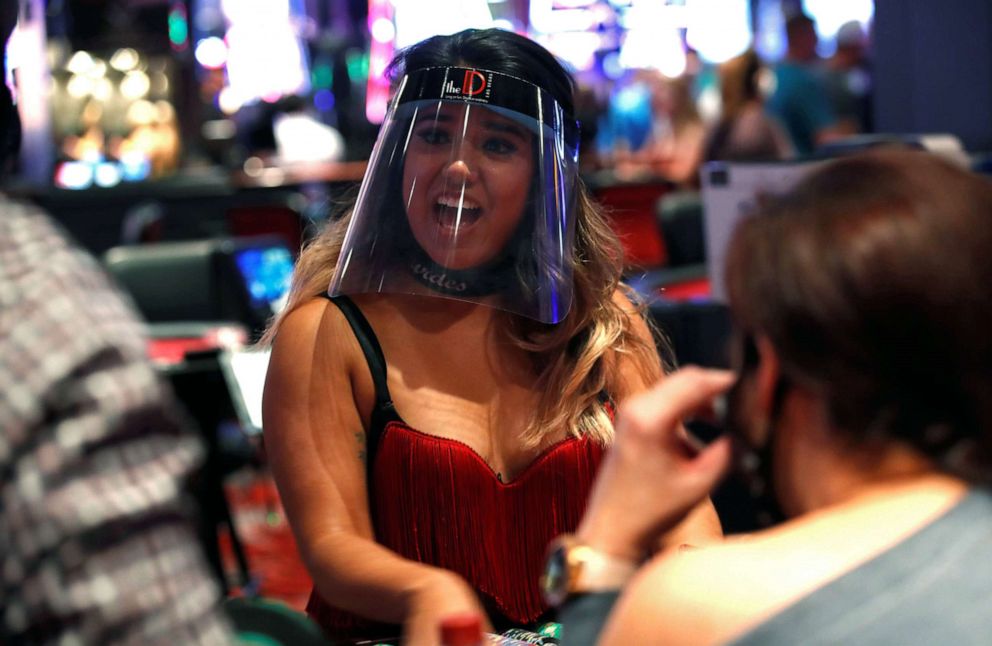 PHOTO: A blackjack dealer wears a face shield during the reopening of The D hotel-casino as part of steps to slow the spread of the coronavirus disease (COVID-19), in downtown Las Vegas, June 4, 2020.