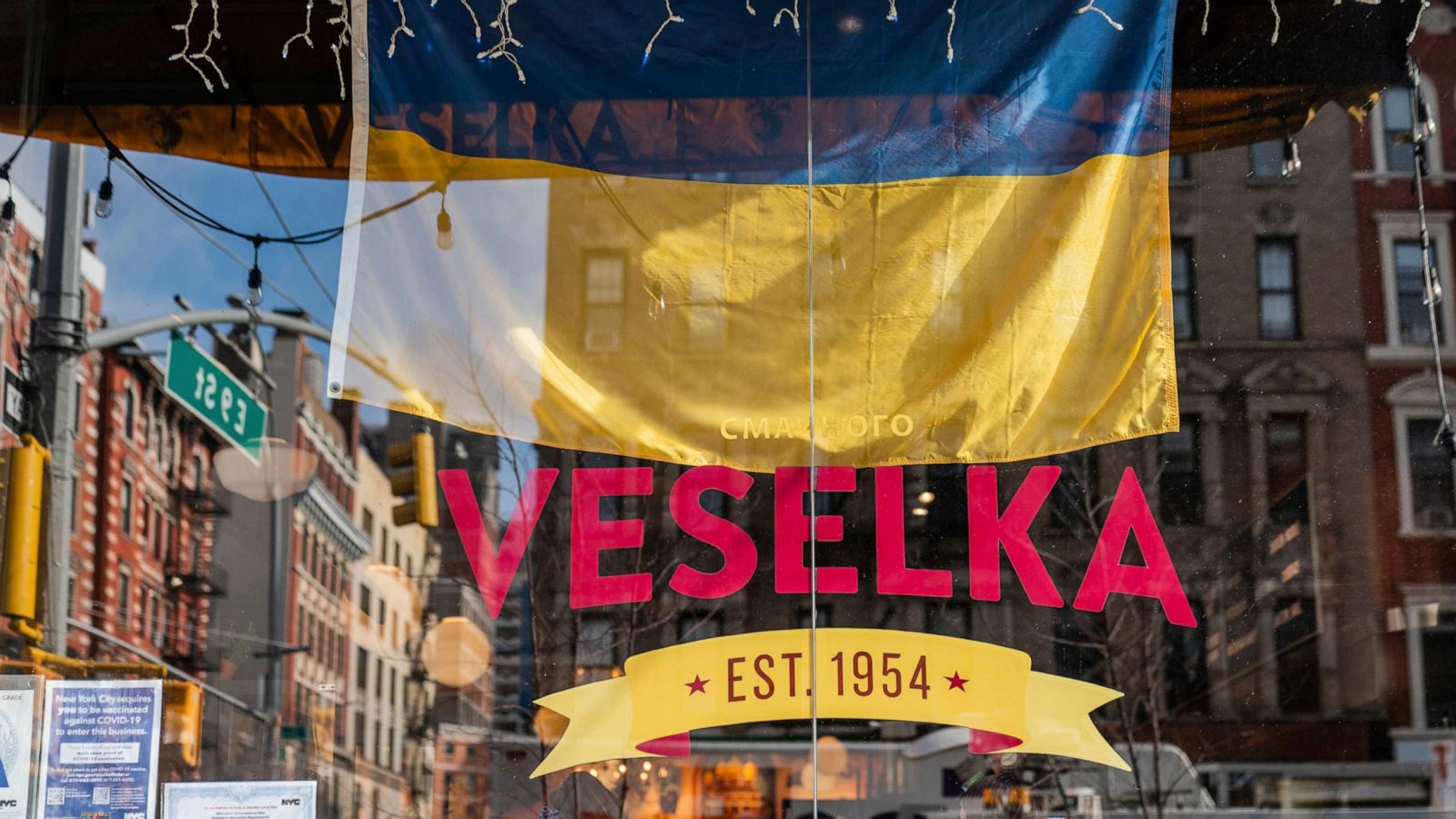 PHOTO: A Ukrainian flag hangs outside Veselka, Feb. 25, 2022, in New York.