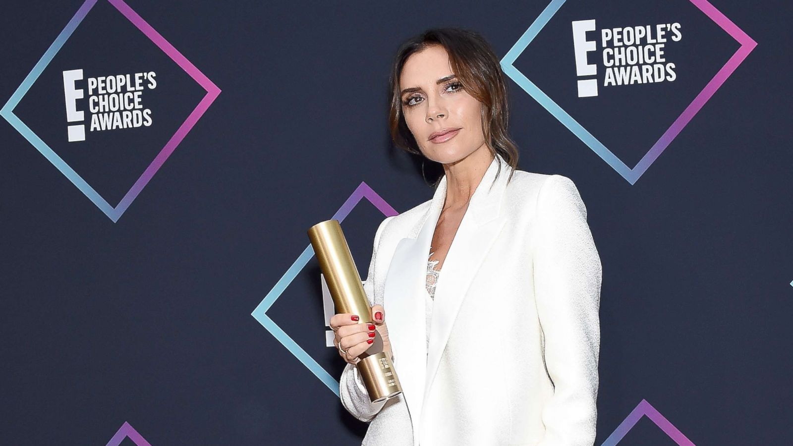 PHOTO: Victoria Beckham, recipient of the 2018 Fashion Icon Award, poses in the press room at the People's Choice Awards 2018 at Barker Hangar, Nov, 11, 2018, in Santa Monica, Calif.