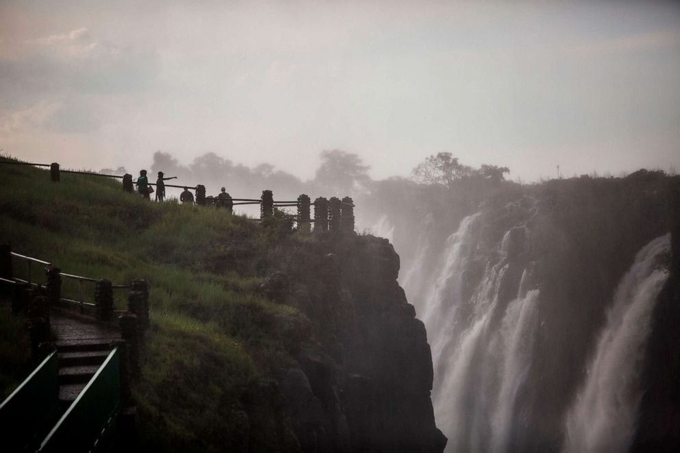 PHOTO: Tourists view the majestic Victoria Falls in Livingstone, Jan. 23, 2020.