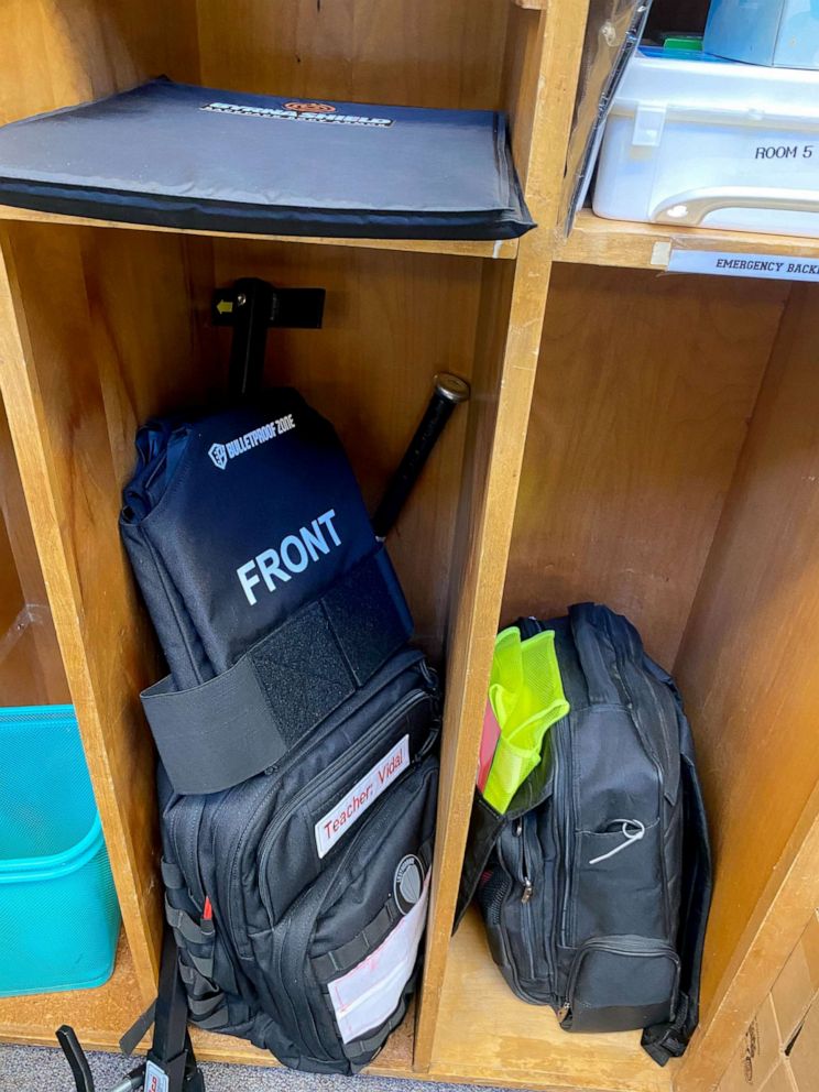 PHOTO: Among the items Kelsey Vidal keeps in her classroom are a backpack with bulletproof inserts, a baseball bat and a school-issued backpack with a neon vest.